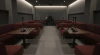 Интерьер кальянной с мягкими диванами и приглушенным светом